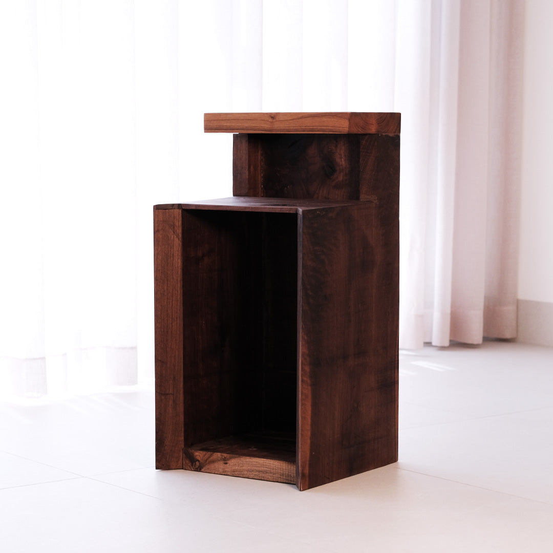 Walnut and teak DuoRest Side Table with sturdy frame and drawer, offering style and utility.